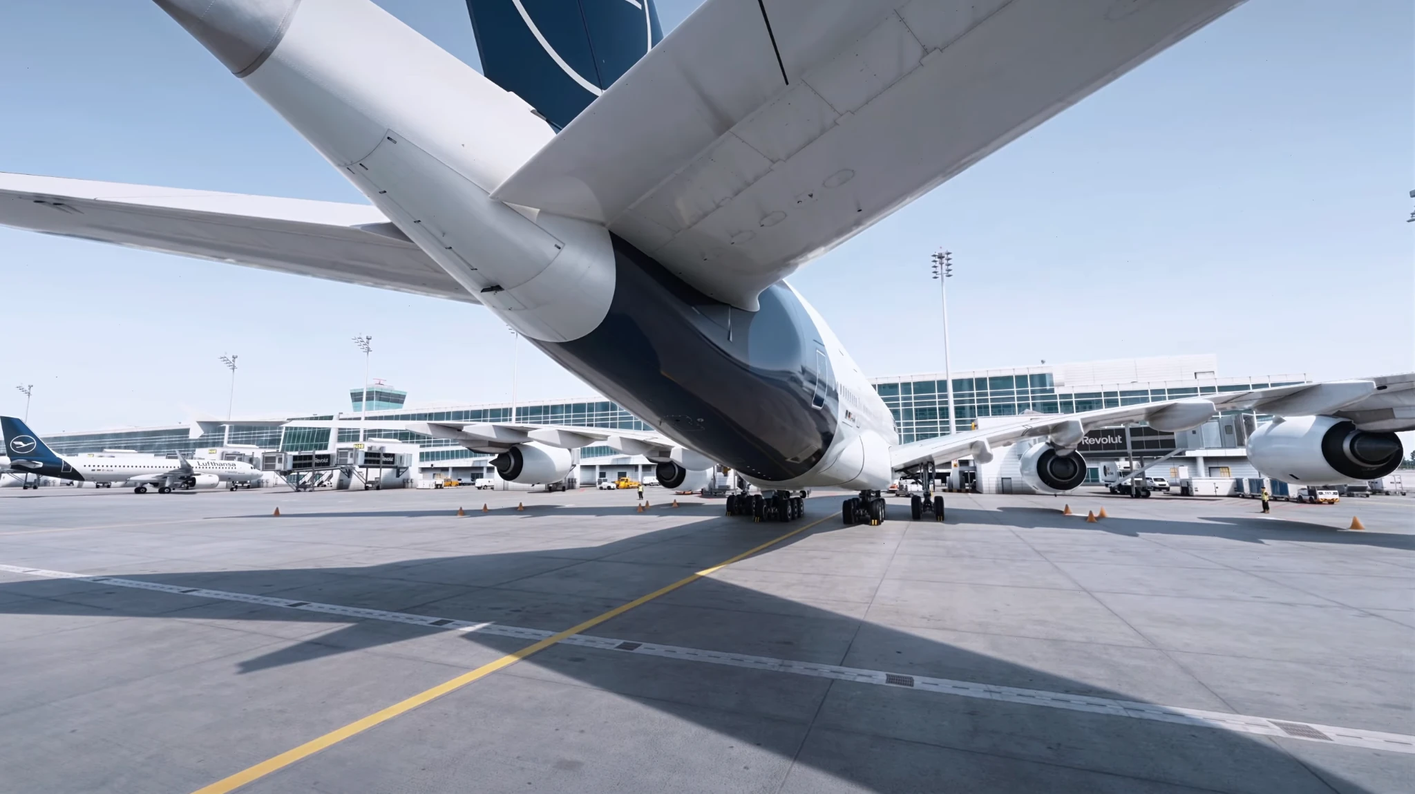 Wide view of the terminal and apron below an aircraft in the simulator