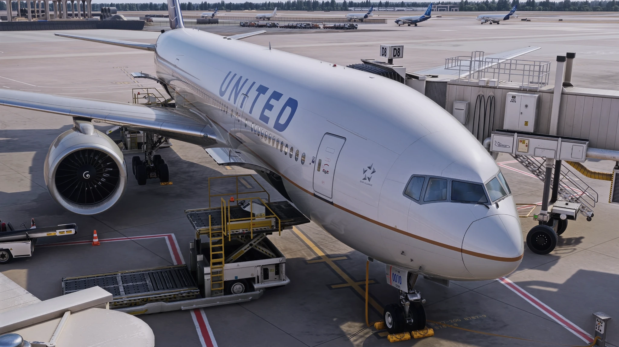 Aircraft at a gate with its ground equipment in the simulator