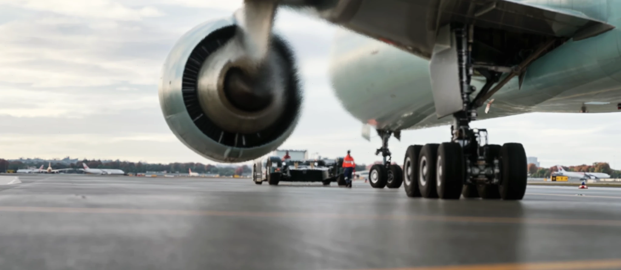 Low view under an aircraft wing on the apron in the simulator